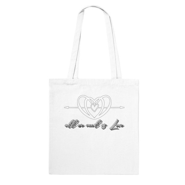 928e4b95-86c7-4d2a-a214-a5fe81fbc76a.jpg White tote bag with the All We Need is Love heart and script design